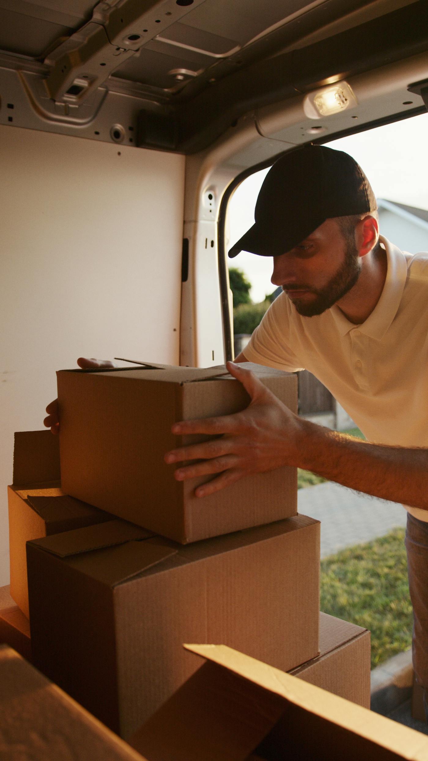 Moving boxes being packed for a Hoffman Estates, Illinois relocation